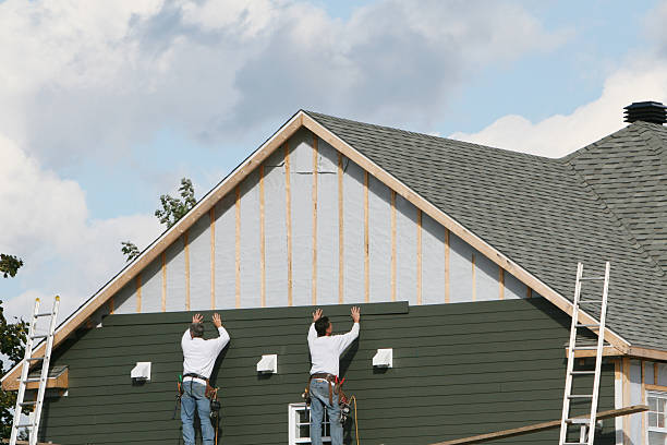 Professional Siding Contractor technician working in Vale, OR